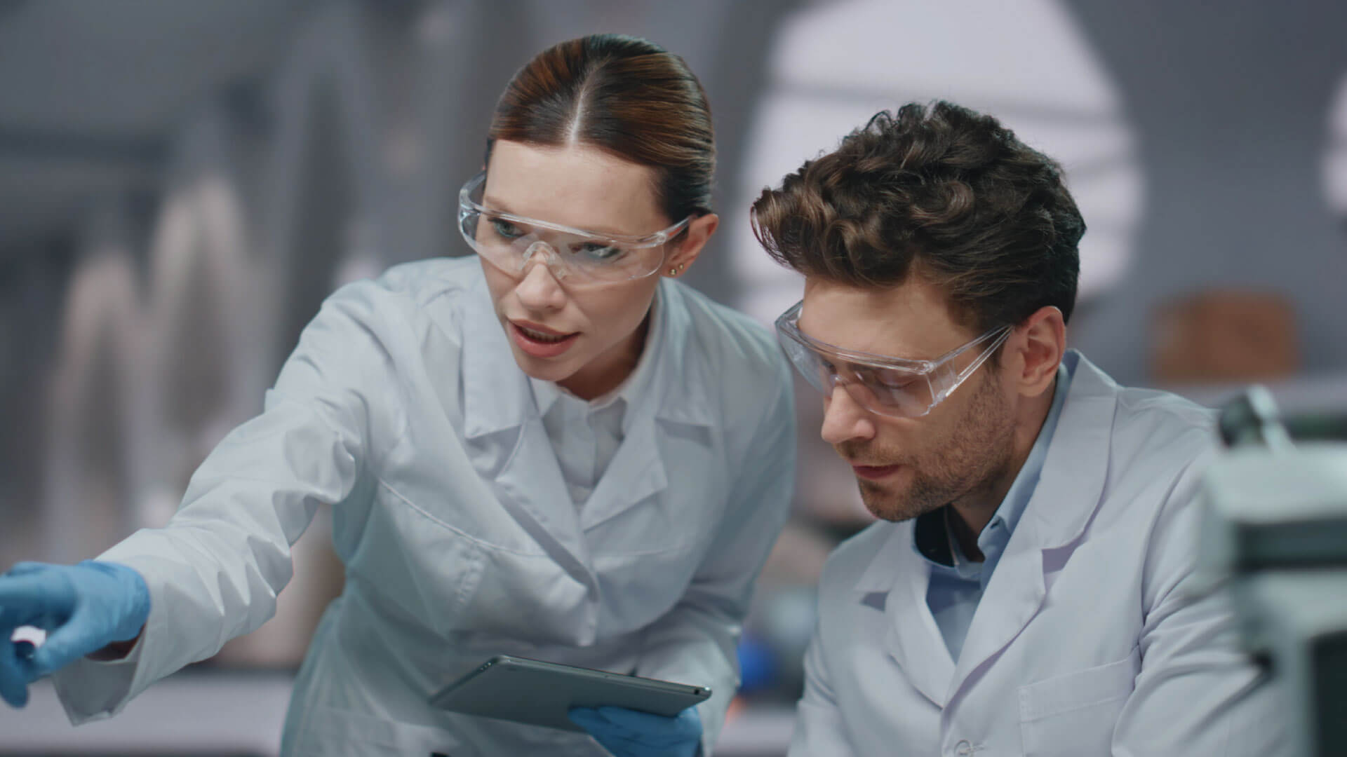 Scientists examining lab samples